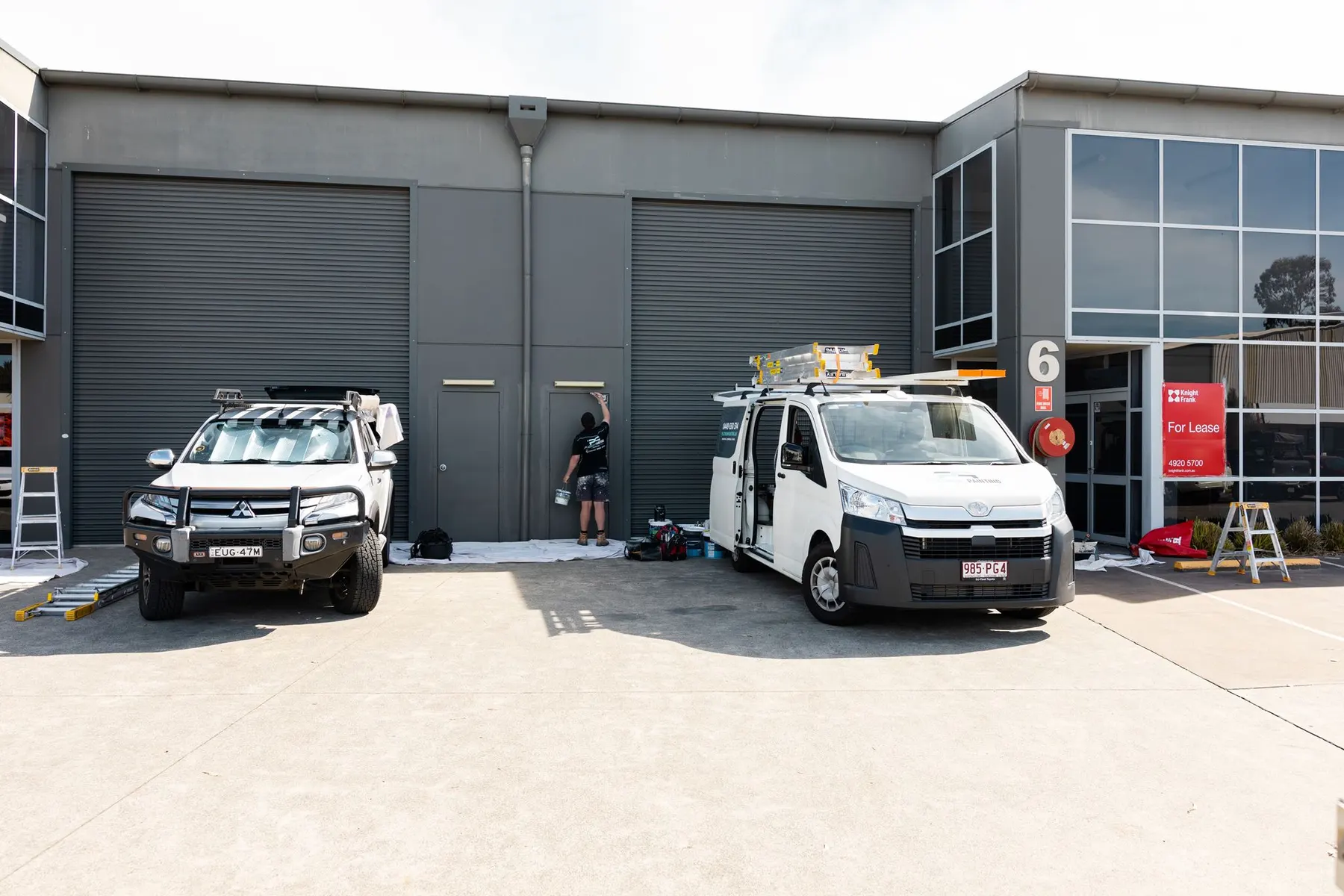 Platinum Painting branded vans and painter on site