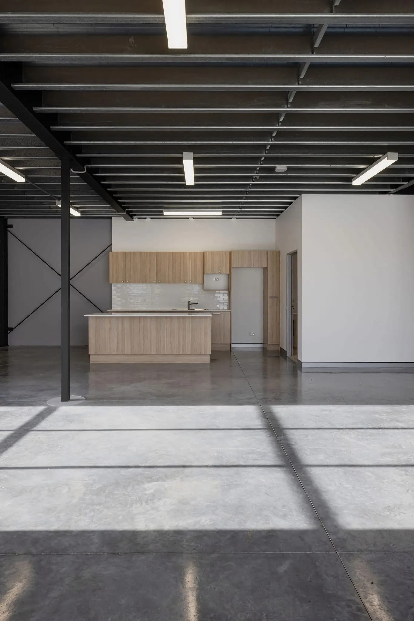 Warehouse interior painted in clean whites